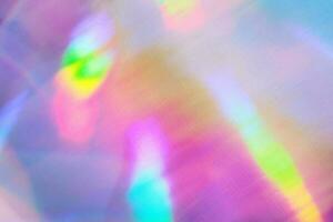 iridescente holográfico textural fundo. metálico papel ou frustrar com iridescente luzes foto