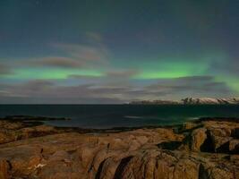 tarde polar panorama com a aurora boreal foto