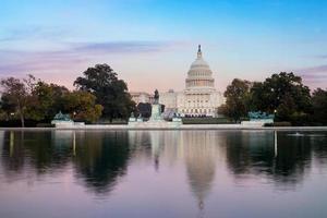 Capitólio dos estados unidos da américa construindo ao nascer e pôr do sol foto