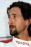 Adrian brody Nota listras do azul cabelo às a Toyota proceleb qualificação dia em abril 17 2009 às a grandes de praia grande prêmio curso dentro grandes de praia Califórnia 2009 kathy cabanas cabanas foto