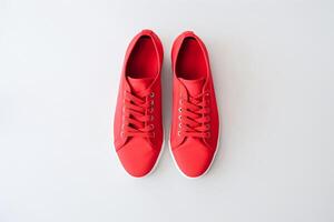 par do Novo à moda branco tênis em vermelho fundo. internacional vermelho tênis dia. generativo ai foto