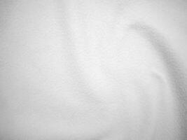flanela sentido branco suave rude têxtil material fundo textura fechar para cima, pôquer tênis de mesa bola, mesa pano. friso branco tecido fundo. foto