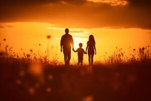 silhueta do feliz família caminhando dentro a Prado às pôr do sol. ai generativo foto