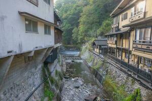 quente Primavera cidades, Kurokawa onsen, Ryokan e ponte, Kurokawa às manhã, kumamoto, kyushu, Japão foto