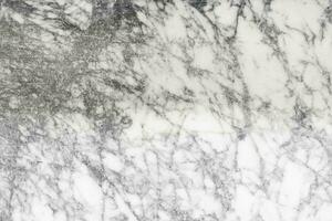 a textura do mármore branco natural feito de azulejos naturais é um fundo luxuoso para trabalhos de design foto