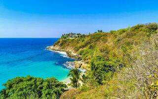 de praia areia azul turquesa água ondas panorama carrizalillo porto escondido. foto