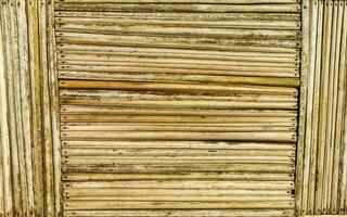 bambu madeira parede e portão textura dentro porto escondido México. foto