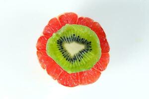 fatiado fruta pilha Toranja kiwi foto