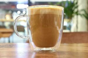 café café com leite Woden mesa foto