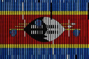 bandeira do reino do Eswatini em uma texturizado fundo. conceito colagem. foto