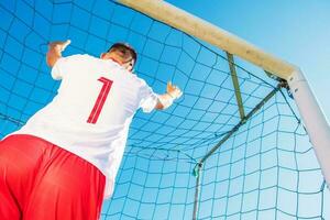 goleiro dentro a objetivo foto