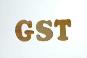 gst bens e serviço imposto alfabeto em branco fundo foto