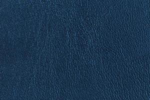close-up da superfície de fundo com textura de couro azul escuro