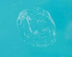 transparente gel dentro azul fundo isolado foto