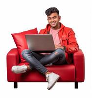 feliz jovem indiano masculino trabalhando em uma computador portátil sentado foto ai gerado