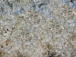 close-up de pedra ou parede de rocha para plano de fundo ou textura foto