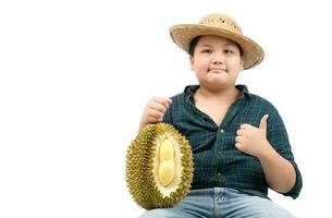 fofa Garoto agricultor aguarde durian e polegares acima para mostrar a qualidade do durian foto