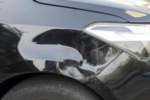 dobrador de pára-choque preto de carro foto