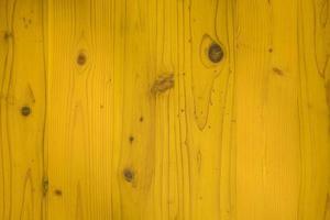 papel de parede amarelo marrom fundo de madeira foto