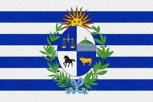 bandeira do Oriental república do Uruguai em uma texturizado fundo. conceito colagem. foto
