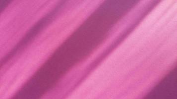sombras diagonais em papel rosa pastel. backgorund abstrato. foto. foto