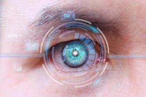 futuro humano com conceito de painel de olho de tecnologia cibernética foto