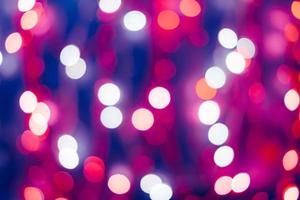 decorações de natal em bokeh de fundo com luzes desfocadas foto