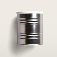 brilhante metal lata com plano deitar conceito isolado em branco fundo. foto