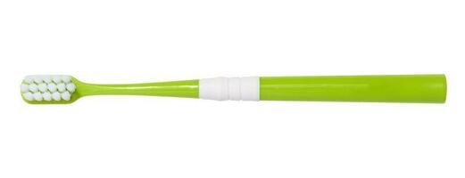verde plástico escova de dente isolado em branco fundo, topo Visão foto