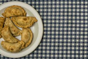 tradicional Argentino cozinha, empanadas foto