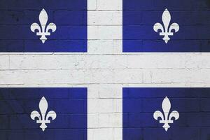 bandeira do quebec pintado em uma parede foto