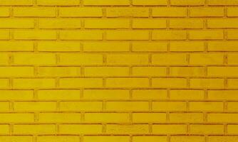 colorida tijolo parede, brilhante amarelo vintage estilo do alvenaria fundo pintura com textura detalhes. foto