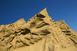 vlychada de praia vulcânico cinza areia Rocha formação em santorini ilha dentro Grécia foto