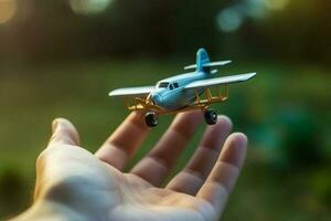 fechar acima foto do masculino mão segurando brinquedo avião contra azul céu . imagem é retro filtrado generativo ai
