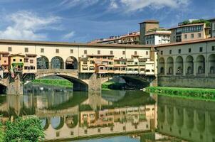 famoso histórico ponte vecchio ponte, florença, toscana, itália foto