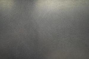 textura de metal riscada, fundo de placa de aço escovado foto