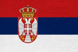bandeira do Sérvia em uma texturizado fundo. conceito colagem. foto