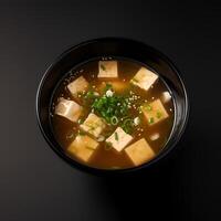 Comida fotografia do missô sopa em Preto tigela isolado em Sombrio fundo. generativo ai foto