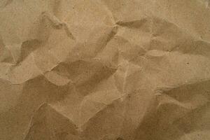 reciclar papel textura fundo. amassado velho kraft papel abstrato forma fundo com espaço papel para texto Alto resolução foto