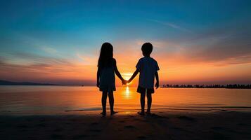 crianças silhueta segurando mãos às pôr do sol em a de praia desfrutando tranquilo momento com deslumbrante cores foto