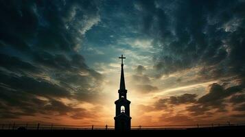 silhueta do Cruz e campanário contra nublado céu às católico Igreja dentro santuário do nosso senhora trsat foto