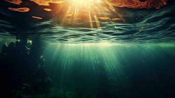generativo ai, Sombrio azul oceano superfície visto a partir de embaixo da agua com Sol luz foto