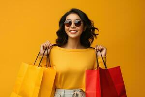 menina com sacolas de compras foto