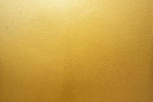 ouro concreto parede em fundo textura. foto