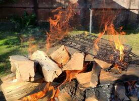 churrasco fogo fundo, período de férias foto