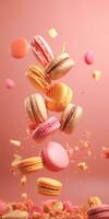 colorida sortimento do macarons flutuando dentro ar em Rosa fundo. criada com generativo ai tecnologia foto