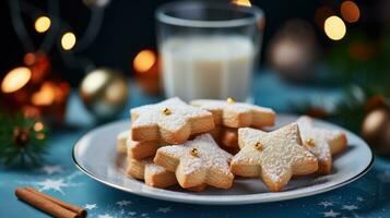 saboroso caseiro Natal biscoitos em azul prato foto