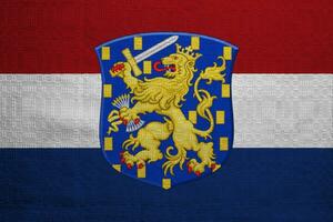 bandeira e casaco do braços do caribe Países Baixos em uma texturizado fundo. conceito colagem. foto