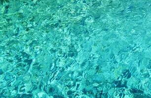 fundo da superfície da água azul foto