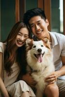 uma alegre jovem casal alegremente tocam com seus cachorro em uma sacada foto